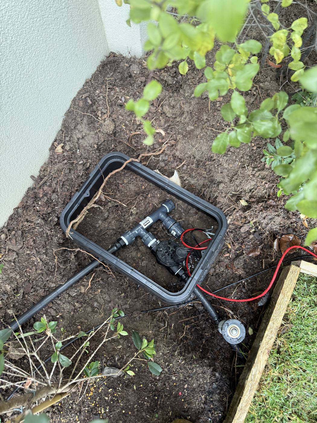 A neat valve manifold set into a ground box