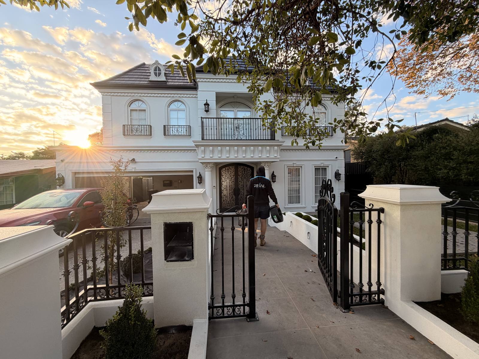 A premium Melbourne home with a lush, irrigated lawn and garden